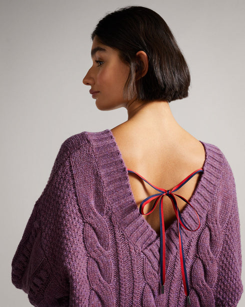 GAIAA-Knitwear-Simple, casual, and comfy … not where GAIAA is concerned. While this bobble knit jumper retains all the classic features that we've come to know and love, ensuring comfort and cosiness at all times, this piece adds a modern-day twist. Part of the MIB collection, the wide neck and low back, complete with bow detailing, adds a little twist to elevate those casual daytime looks. Ted Baker MIB collection Wide v neck Deep back Back ribbon detail Oversized sleeves Ribbed cuffs Our model is 5'9"/